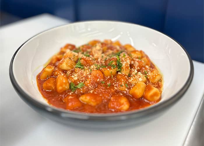 bowl of gnocchi with pasta sauce