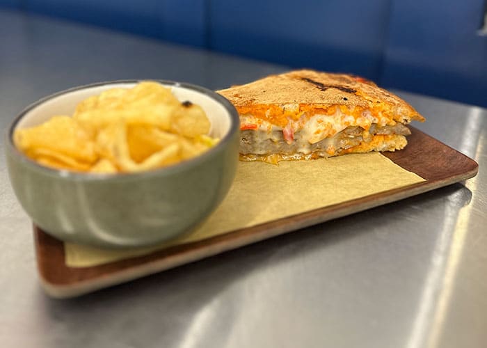 house-made panini and bowl of chips